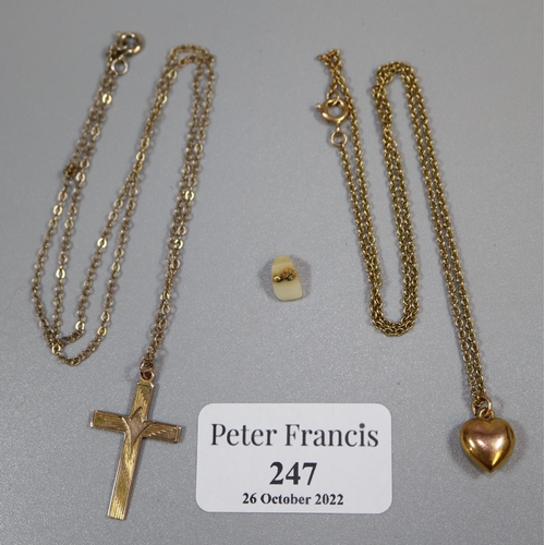 247 - 9ct gold cross pendant on chain, a 9ct gold heart pendant on a gilt metal chain and a gold set tooth... 