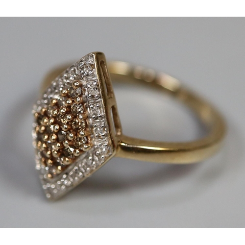 249 - 9ct gold ring set with cinnamon and white diamonds.  Ring size N & 1/2.  Approx weight 2.2 grams.
(B... 