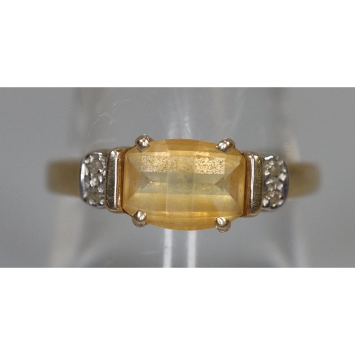 263 - 9ct gold yellow stone and diamond ring.  Ring size P.  Approx weight 2.2 grams.
(B.P. 21% + VAT)