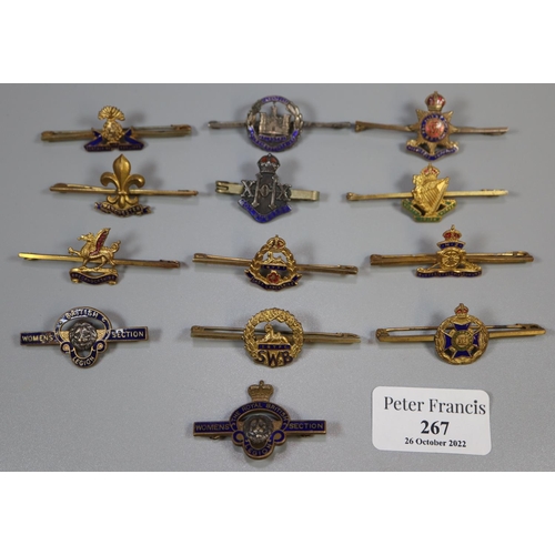 267 - Collection of military type pin bar brooches, to include: South Wales Borderers, Royal Artillery, Ro... 