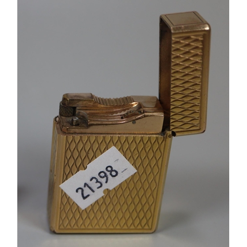 270 - Dupont of Paris gilt metal cigarette lighter.  (B.P. 21% + VAT)