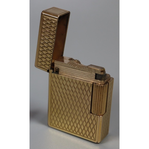 270 - Dupont of Paris gilt metal cigarette lighter.  (B.P. 21% + VAT)