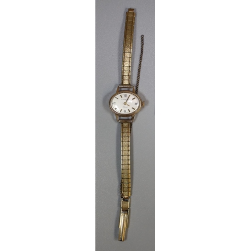 292 - Everite 9ct gold ladies oval wristwatch with Baton and Roman numerals on a plated strap.  (B.P. 21% ... 