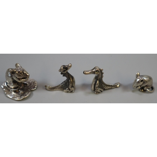 314 - Group of silver miniature animals, to include: two mice and two dragons. All Birmingham hallmarks, A... 