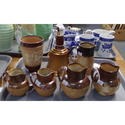 383 - Tray of stoneware to include: Royal Doulton Bell's Scotch whisky decanter, a flagon with raised Egyp... 