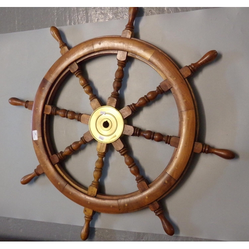 483 - Modern hardwood and brass ship's wheel.  (B.P. 21% + VAT)