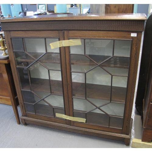 498 - Early 20th century oak two door astragal glazed bookcase.   (B.P. 21% + VAT)