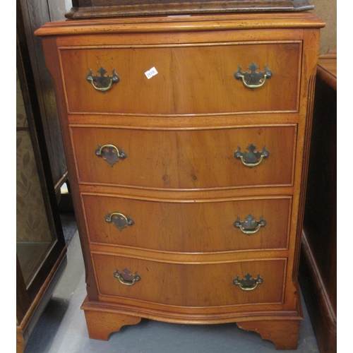 505 - Reproduction yew wood serpentine chest of four drawers on projecting base with bracket feet.  (B.P. ... 