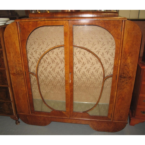 506 - Art Deco walnut two door glazed display cabinet with glass shelves. (B.P. 21% + VAT)