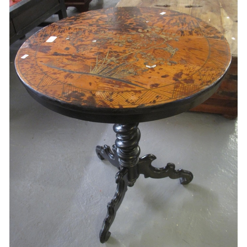 529 - 19th century ebonised circular tripod table on barley twist pedestal and shaped feet, the top decora... 