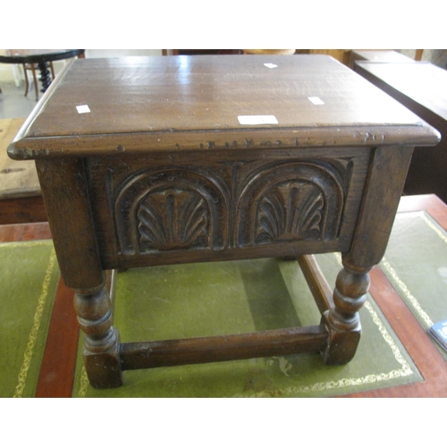 535 - 17th century style oak work box, the hinged lid above a carved frieze on turned legs and shaped supp... 