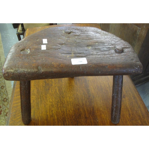 548 - Primitive design  elm milking stool.  (B.P. 21% + VAT)