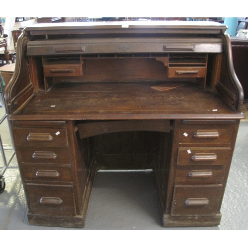 549 - Early 20th century oak 'S' roll knee hole desk.  (B.P. 21% + VAT)