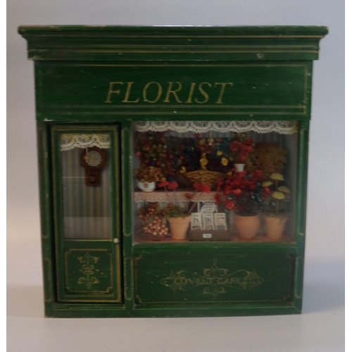 112 - Wooden model study of a Florist Shop, marked 'Covent Garden'.  30x10x31cm approx.  (B.P. 21% + VAT)