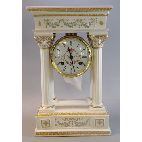 116 - Modern ceramic architectural design pillared two train mantle clock with raised floral and foliate d... 