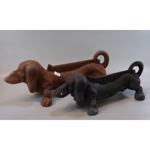 127 - Two similar cast iron boot scrapers in the form of Dachshunds.  (2)    (B.P. 21% + VAT)