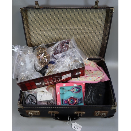 219 - Tin box of assorted costume jewellery and African beaded items, together with a suitcase of items, C... 