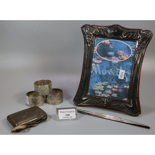 230 - Bag of silver to include: three napkin rings, silver cigarette case etc.  (6.4 troy ozs. approx)  to... 