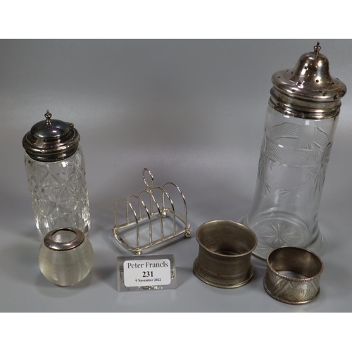 231 - Bag of silver and silver plate items, to include: globular and glass match striker, toast rack, napk... 