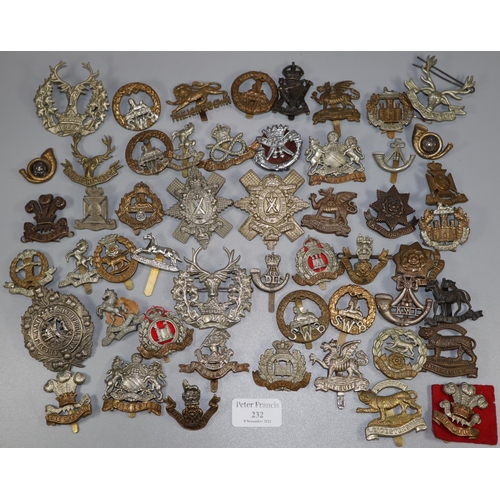 232 - Collection of assorted British military cap badges, various.  Many WWI period, Infantry badges, some... 