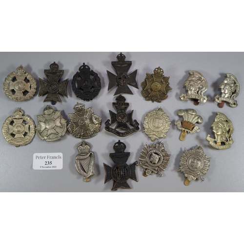 235 - Collection of assorted British military cap badges, to include: Twelfth County of London Battalion t... 