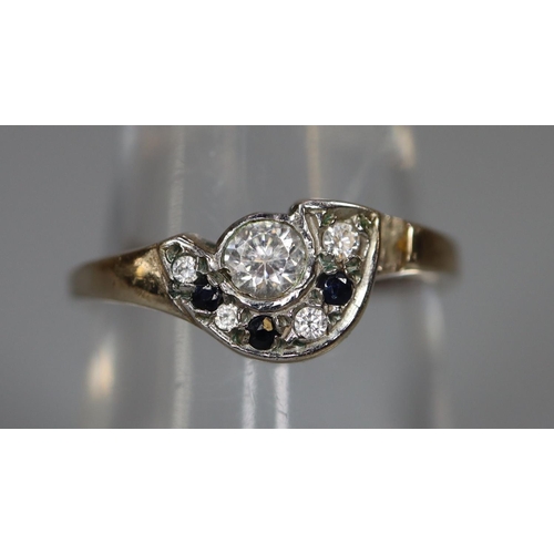 238 - 9ct whit gold 'D' shaped dress ring, set with diamonds and sapphires.  3g approx.  ring size M.  (B.... 