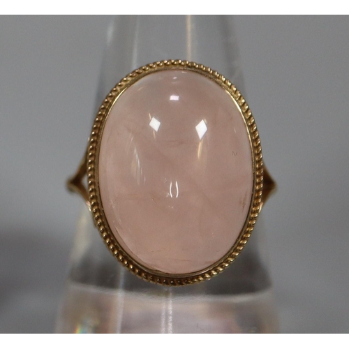 240 - 9ct gold Georgian design split shank dress ring set with cabochon moon stone.  6g approx.   Ring siz... 