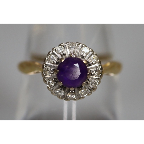 244 - 18ct gold amethyst and diamond dress ring.  2.5g approx.  Ring size M.  (B.P. 21% + VAT)