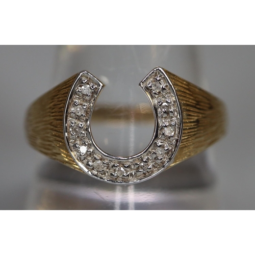 247 - 9ct gold diamond set horseshoe design dress ring.  3.2g approx.  Ring size R.  (B.P. 21% + VAT)