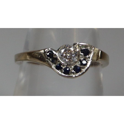 250 - 9ct white gold 'D' shaped diamond and sapphire dress ring.  2.2g approx.  Ring size N.  (B.P. 21% + ... 