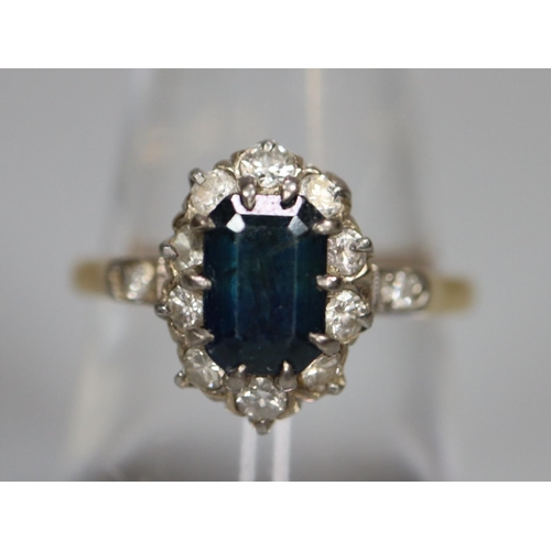 252 - Yellow metal diamond and sapphire dress ring.  3.5g approx.  Ring size N1/2.  (B.P. 21% + VAT)
