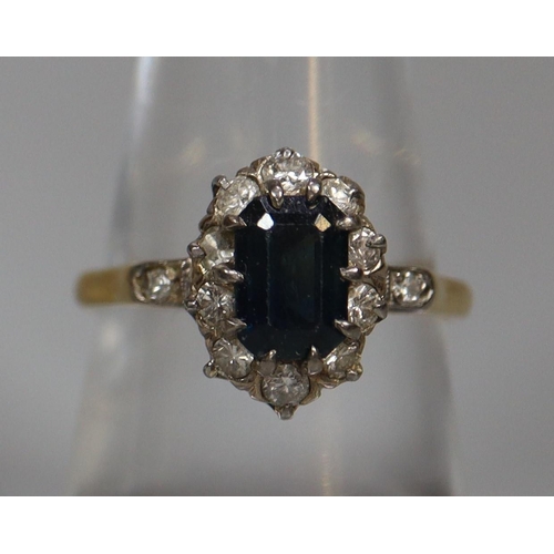 252 - Yellow metal diamond and sapphire dress ring.  3.5g approx.  Ring size N1/2.  (B.P. 21% + VAT)