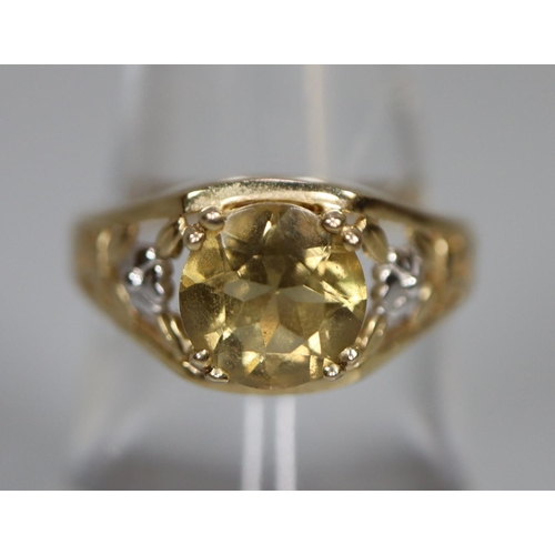 254 - 9ct gold yellow stone dress ring with pierced floral shank.  3.5g approx.  Ring size N.  (B.P. 21% +... 