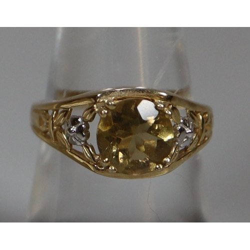 254 - 9ct gold yellow stone dress ring with pierced floral shank.  3.5g approx.  Ring size N.  (B.P. 21% +... 