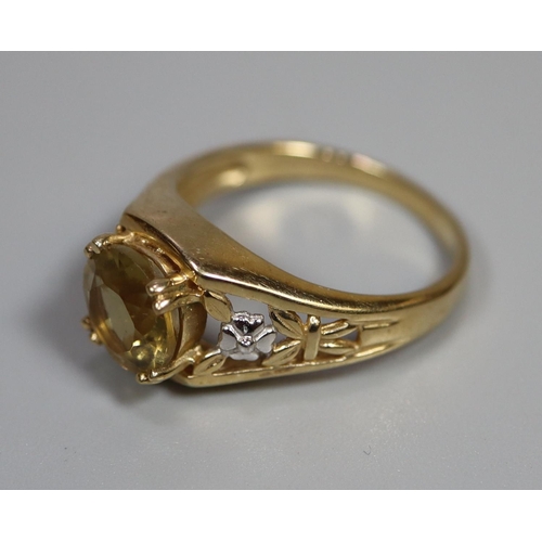 254 - 9ct gold yellow stone dress ring with pierced floral shank.  3.5g approx.  Ring size N.  (B.P. 21% +... 