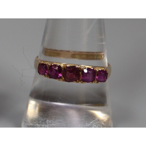 259 - 15ct gold five stone amethyst dress ring.  2.2g approx.  Ring size O.  (B.P. 21% + VAT)