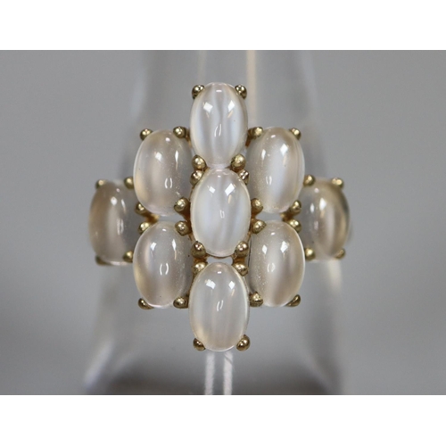 260 - 9ct gold multi stone moonstone dress ring.  2.9g approx.  Ring size M.    (B.P. 21% + VAT)