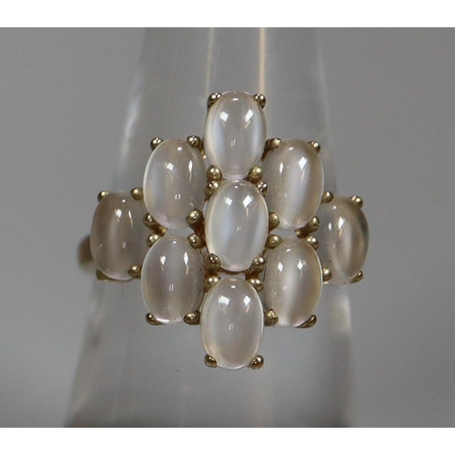 260 - 9ct gold multi stone moonstone dress ring.  2.9g approx.  Ring size M.    (B.P. 21% + VAT)