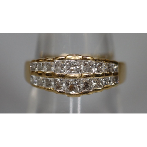 261 - 18ct gold diamond double row eternity ring.  3.6g approx.  Ring size M.  (B.P. 21% + VAT)