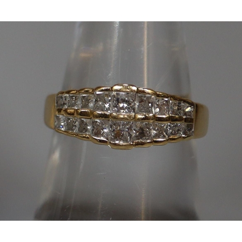 261 - 18ct gold diamond double row eternity ring.  3.6g approx.  Ring size M.  (B.P. 21% + VAT)