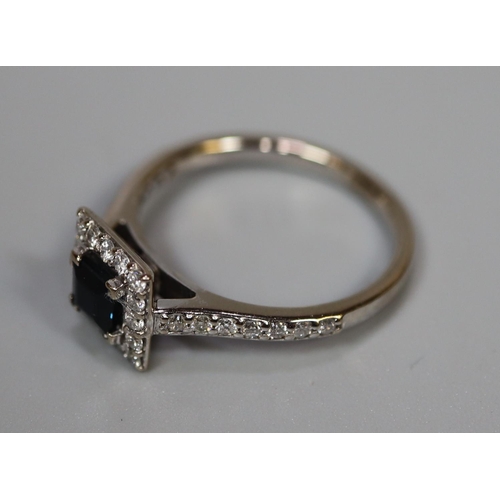 262 - 18ct gold diamond and sapphire square setting dress ring.  3.5g approx.  Ring size M.  (B.P. 21% + V... 