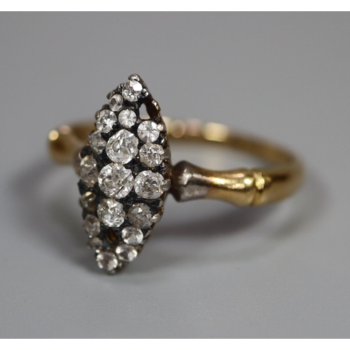 272 - 18ct gold diamond and white stone set marquise shaped dress ring (2 stones missing).  3.3g. approx. ... 