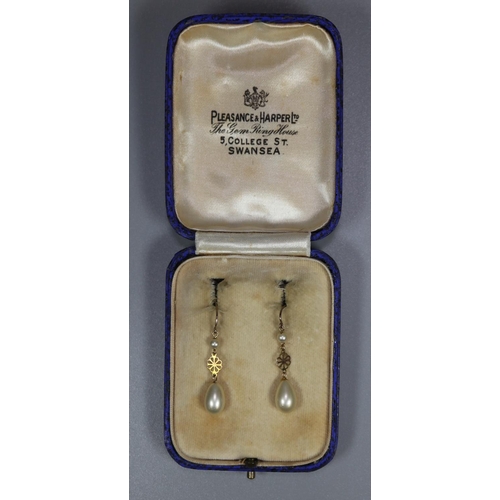 273 - Cased pair of gold pearl drop flowerhead design earrings.  Pleasance and Harper Ltd. of Swansea box.... 