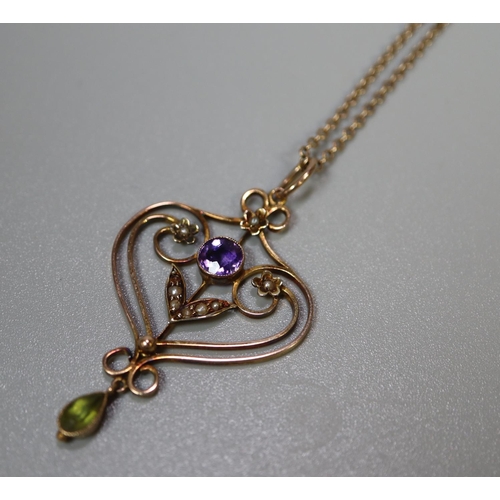 277 - Pretty Art Nouveau design 9ct gold heart shaped pendant set with stones and seed pearls on fine link... 