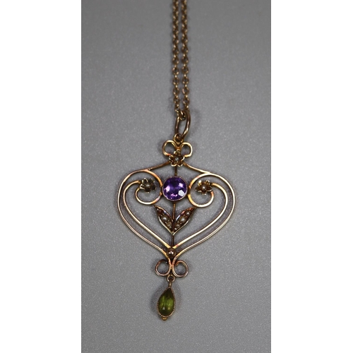 277 - Pretty Art Nouveau design 9ct gold heart shaped pendant set with stones and seed pearls on fine link... 