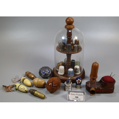 308 - Collection of sewing accessories, to include: silver and other thimbles, pin cushion in the form of ... 