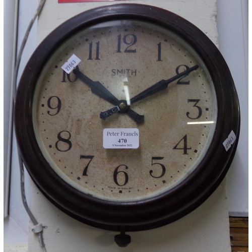 470 - Smiths eight day military Bakelite broad arrow wall clock with military marking and dated 1945 to th... 