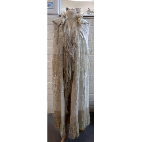 491 - Good quality probably Edwardian silk cape with embroidered and fringe detail (probably made out of p... 