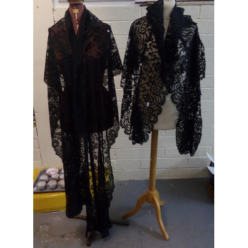 497 - Two late 19th/early 20th Century black lace shawls. (2)
(B.P. 21% + VAT)