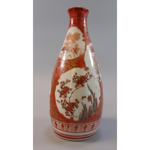 61 - Japanese porcelain Kutani Tokuri sake bottle, overall decorated with reserve panels of foliage and f... 